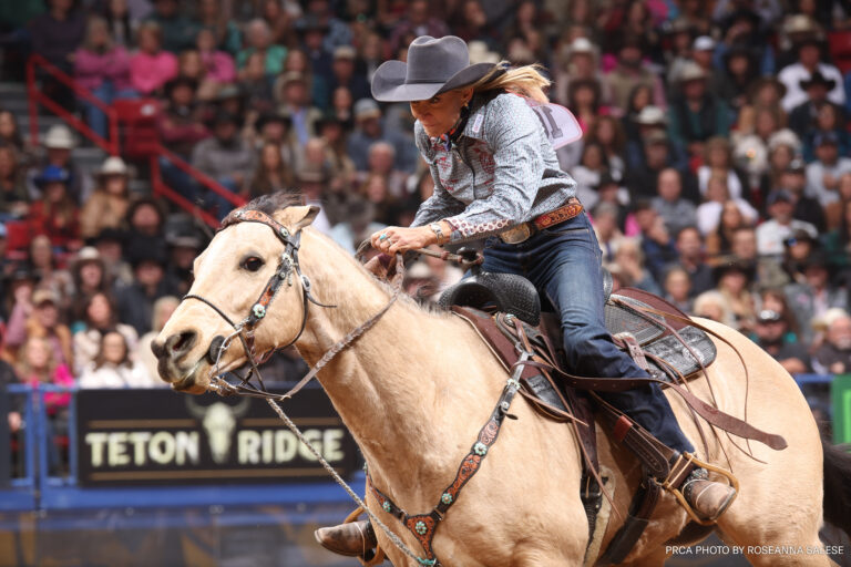 Sue Smith and Hef barrel racing
