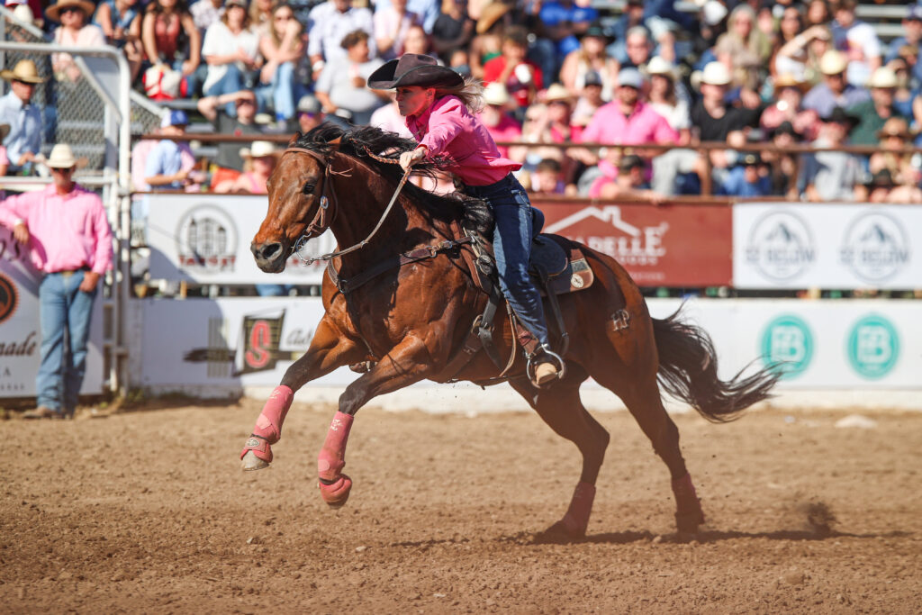 Wenda Johnson and Steal Money "Mo" barrel racing Clovis