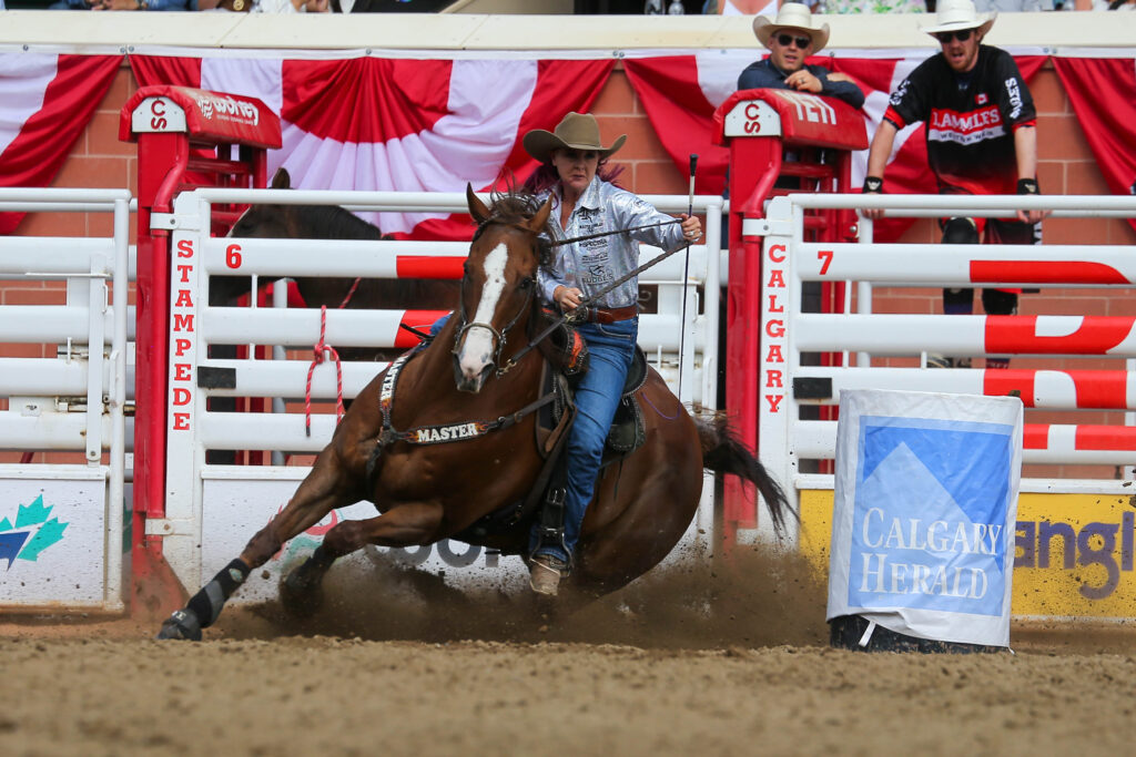 Leslie Smalygo barrel racing Gus