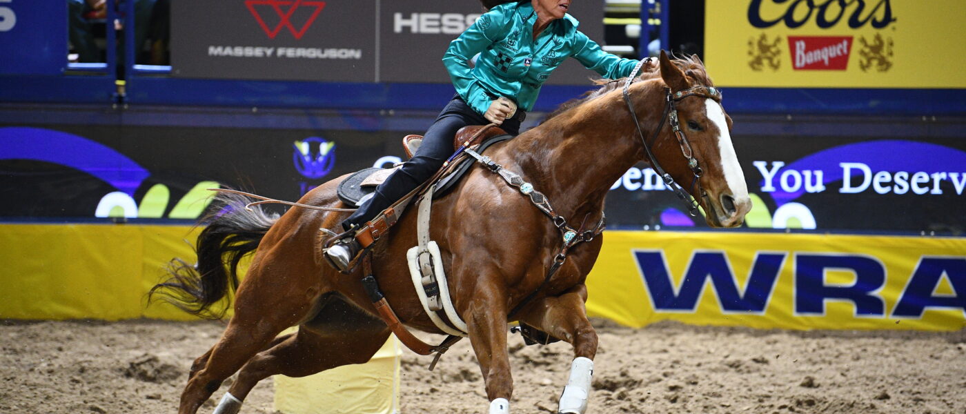 Andrea Busby and Jets Top Gun Benny NFR barrel racing