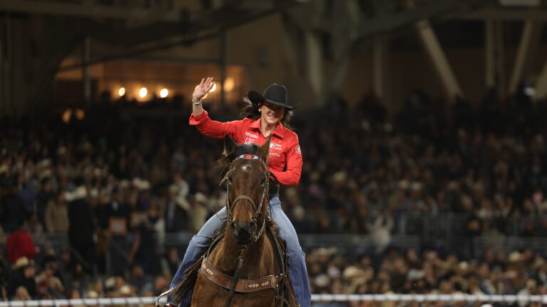 Jordan Driver waves during victory lap San Diego Rodeo
