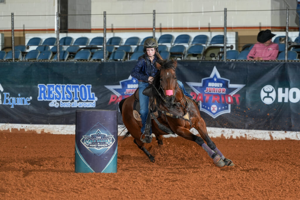 Molly Dismuke barrel racing