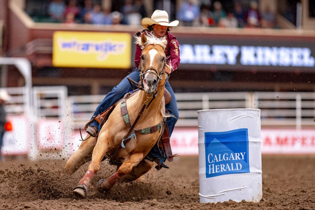 Hailey Kinsel barrel racing at Calgary Stampede