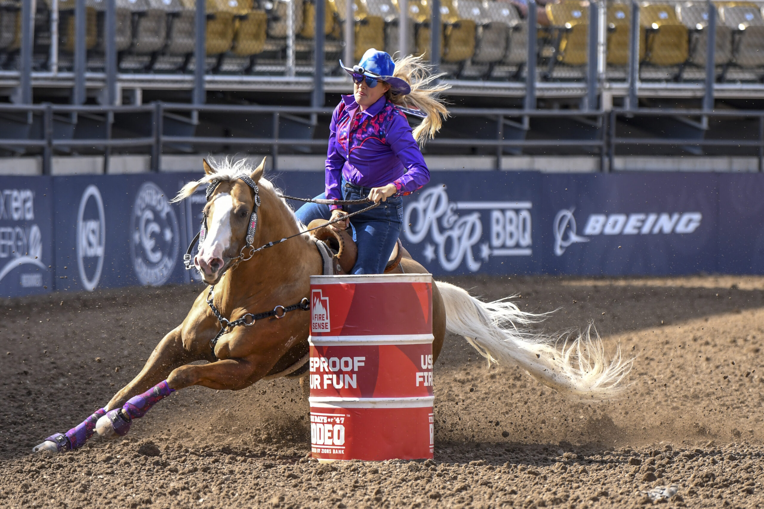Tricia Aldridge barrel racing in Utah, turning barrel