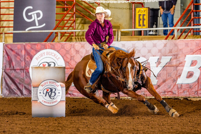 Sydney Graham barrel races on Dupont First