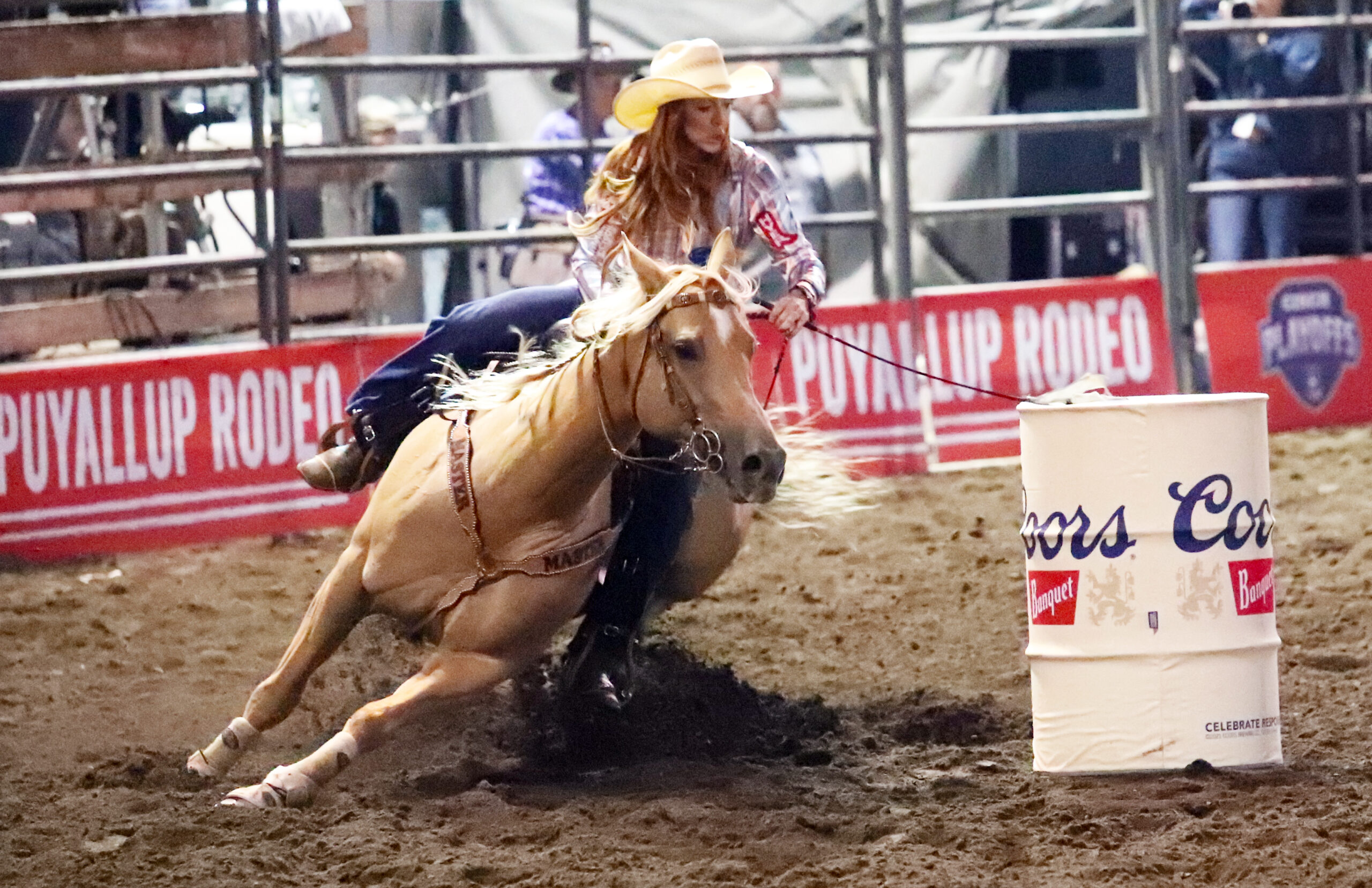 Emily Beisel barrel racing on Chewy in Puyallup