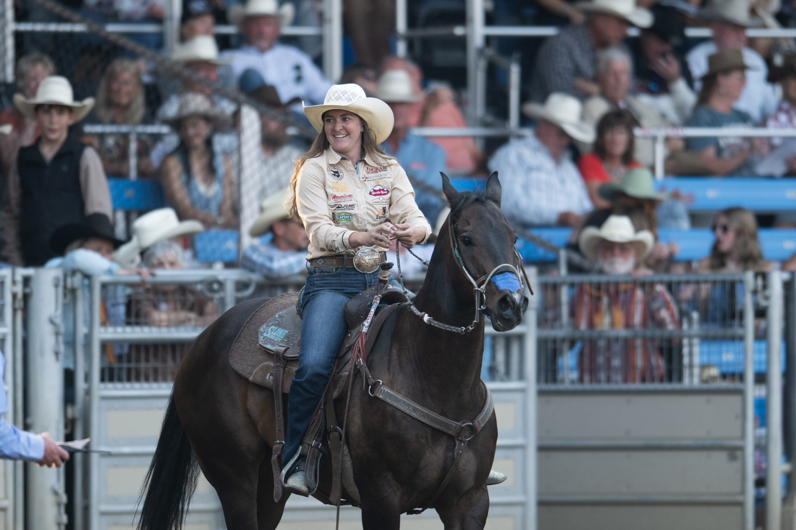 Tayla Moeykens smiles on her horse Lizard in Pendleton