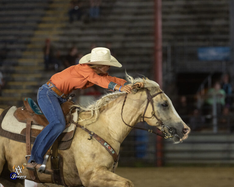 Katelyn Scott barrel racing on Peanut Seed