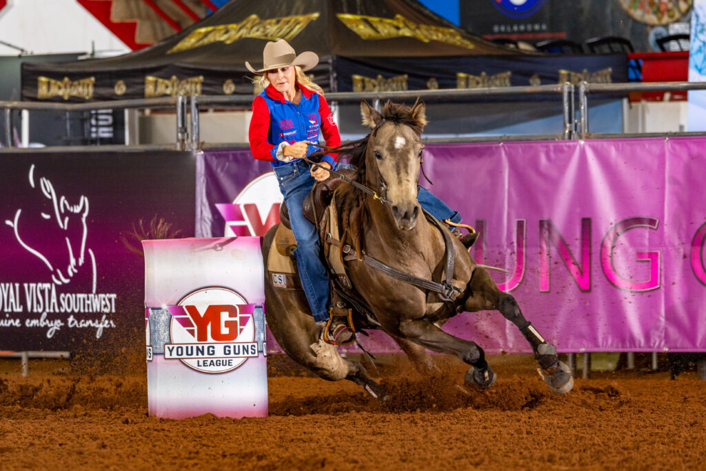 Cathys Kandy barrel racing with Carlee Otero turning a barrel
