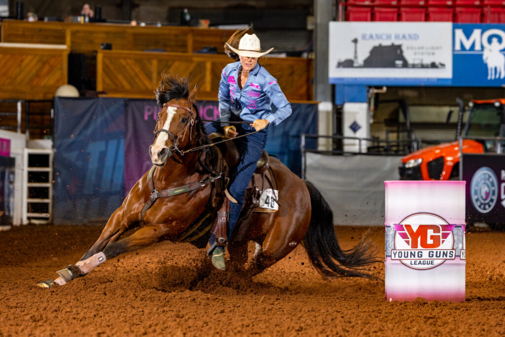 Hallie Hanssen turns a barrel on WR Famous Delight