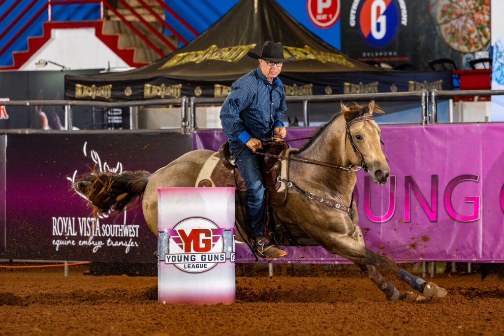 Shawn Varpness barrel racing on The Kandyman Kid