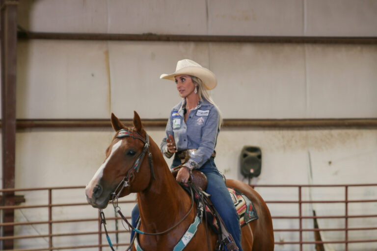 Amy sitting on a horse