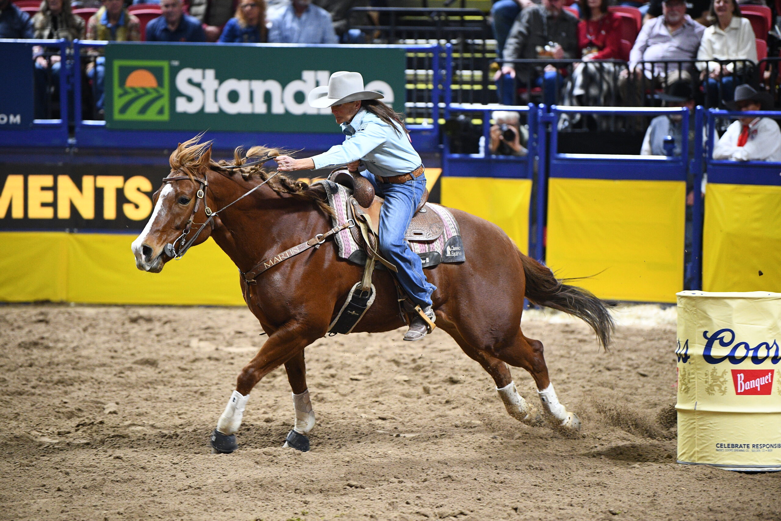 Lisa Lockhart runs barrels at the NFR