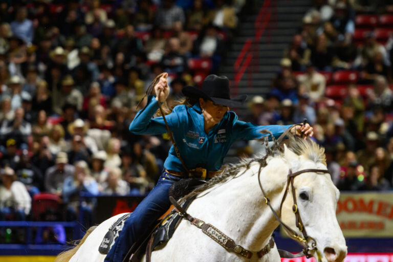 Kassie Mowry on Will at the NFR running home