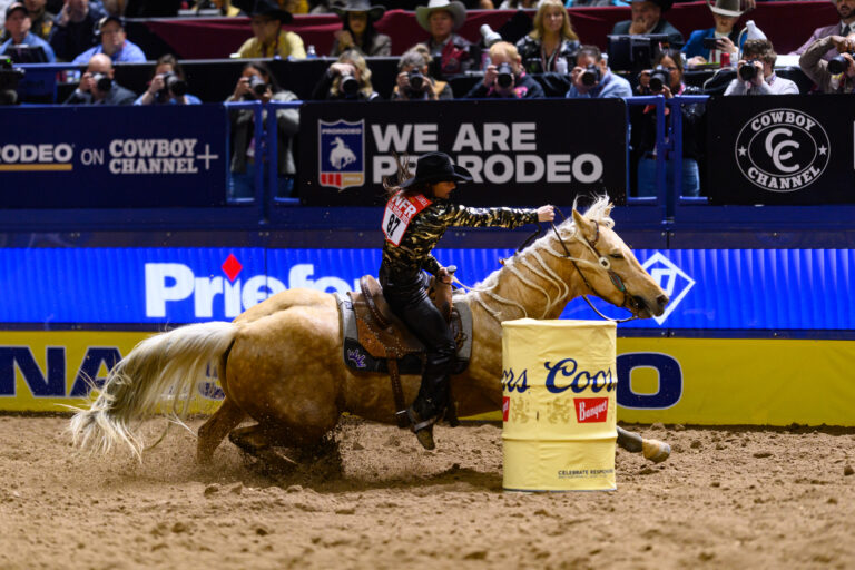 Hayle Gibson-Stillwell turns a barrel at the NFR