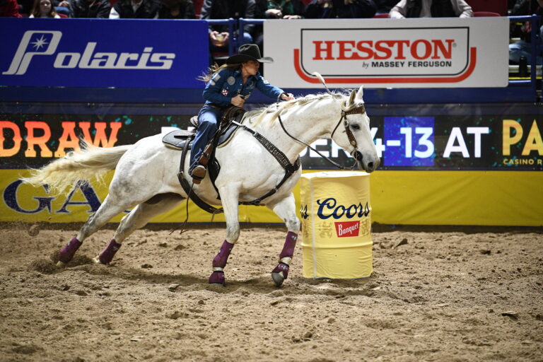 Brittany Pozzi Tonozzi turns a barrel on Sir Epic at the NFR