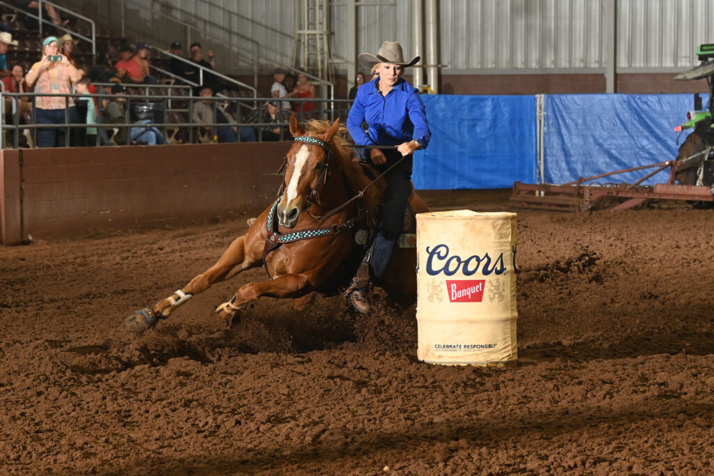 Mindy Holloway turns a barrel on Heavens Got Credit