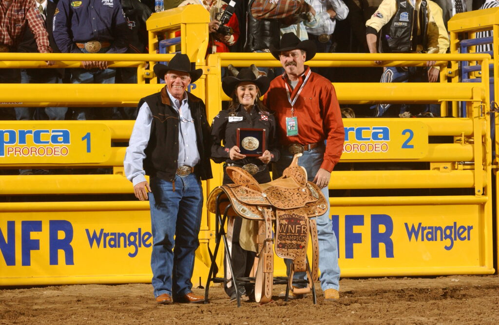Brittany Pozzi accepts her 2006 NFR average saddle