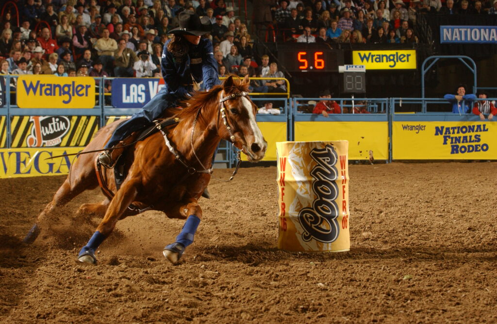 Brandie Halls turns a barrel at NFR on Slim