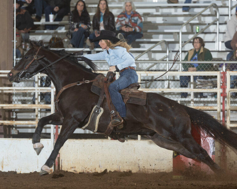 Kara Kreder on her barrel horse
