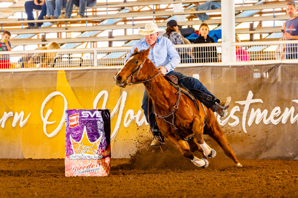 Cody Hyde barrel racing on his horse