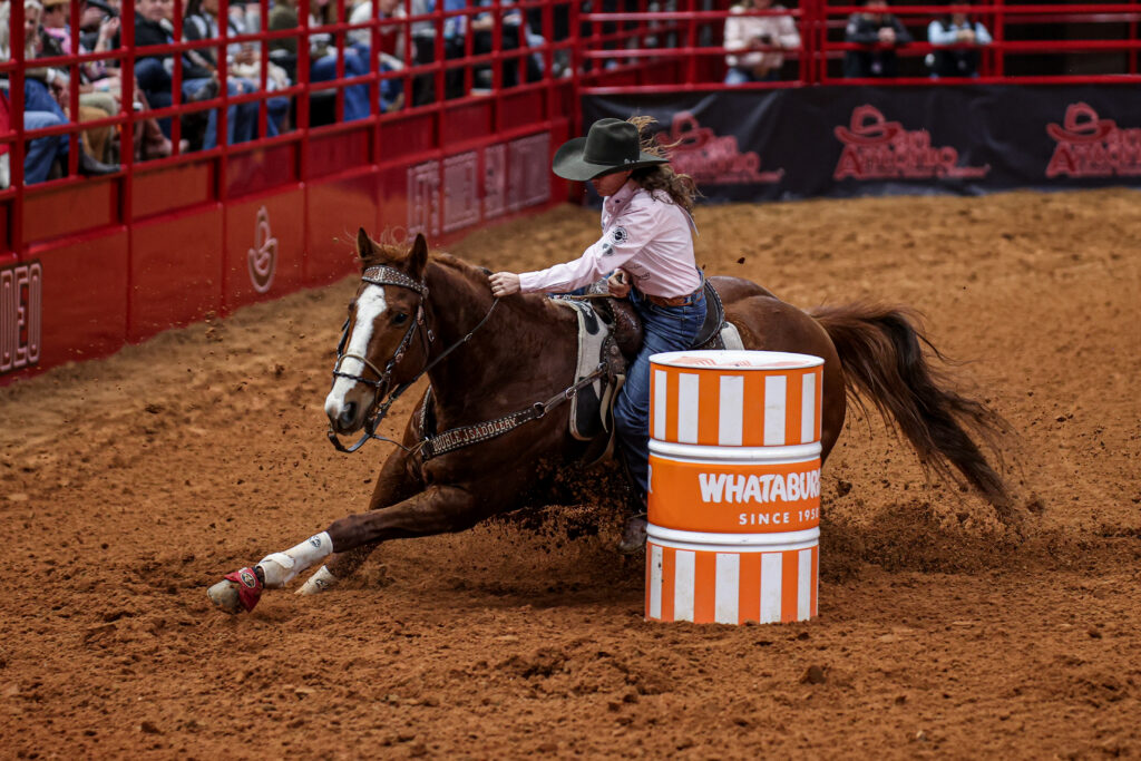 Brittany Tonozzi turns a barrel at San Antonio