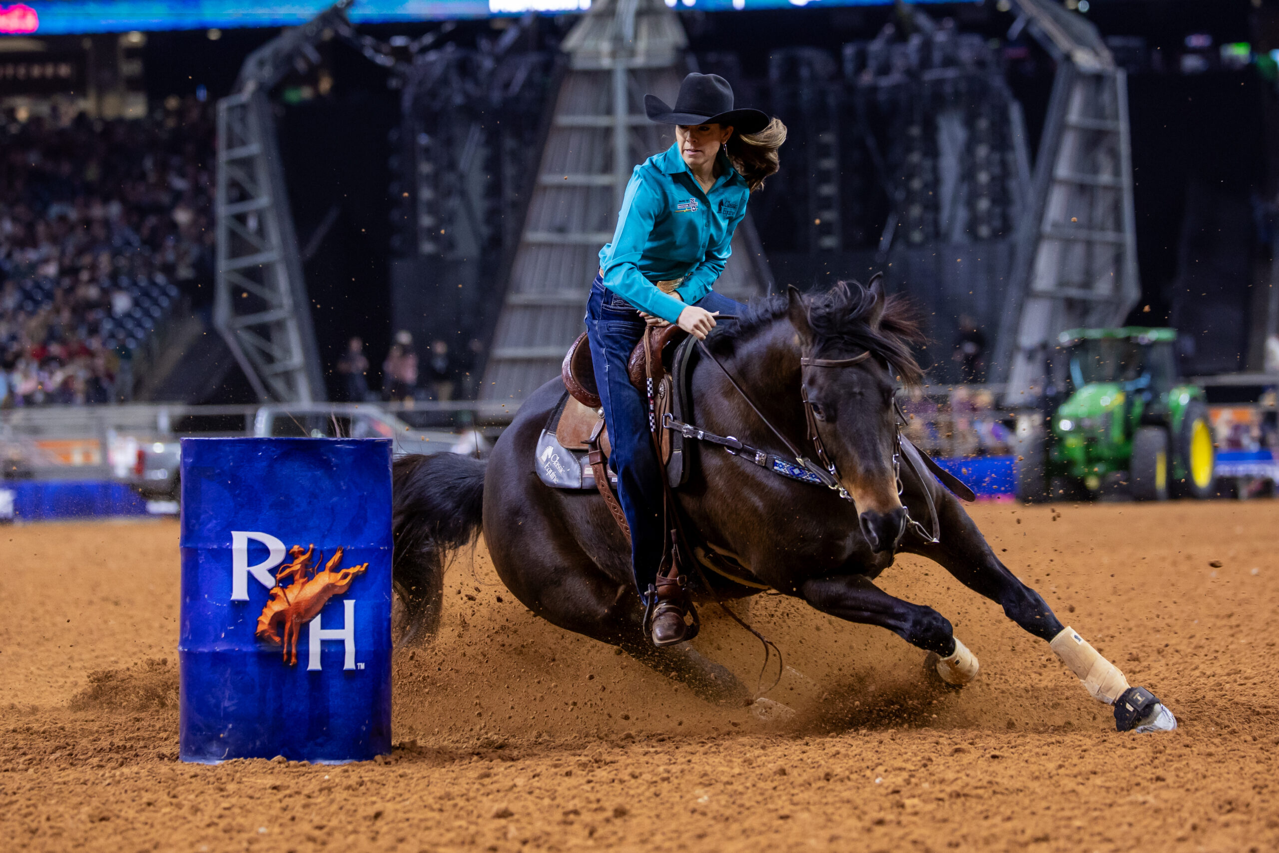 Kassie Mowry and Force The Goodbye turn a blue Houston barrel