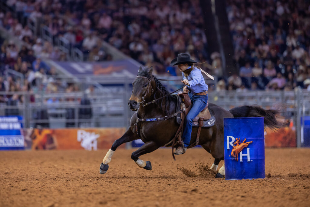 Kassie Mowry turns a barrel at Houston