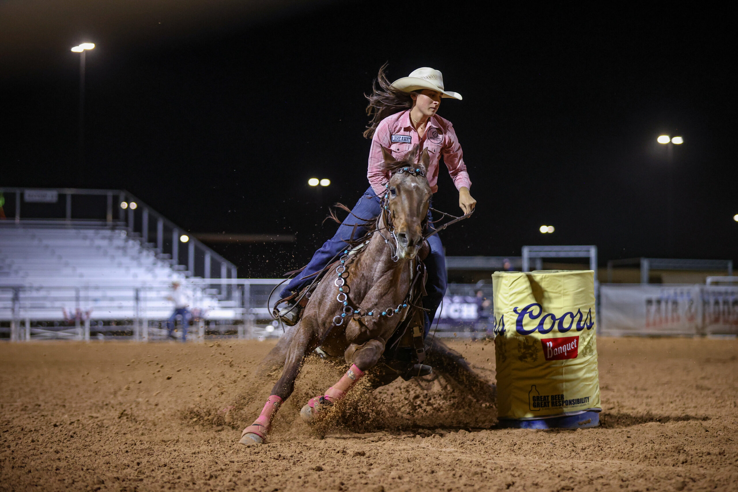 Madison Camozzi turns a barrel at Logandale on her roan horse
