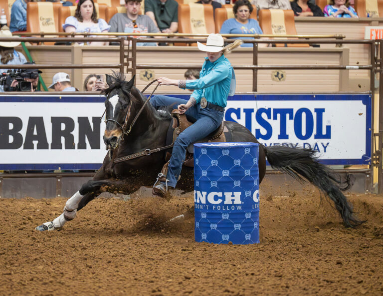 Morgan Bagnell turns a barrel at Resistol Rookie Roundup