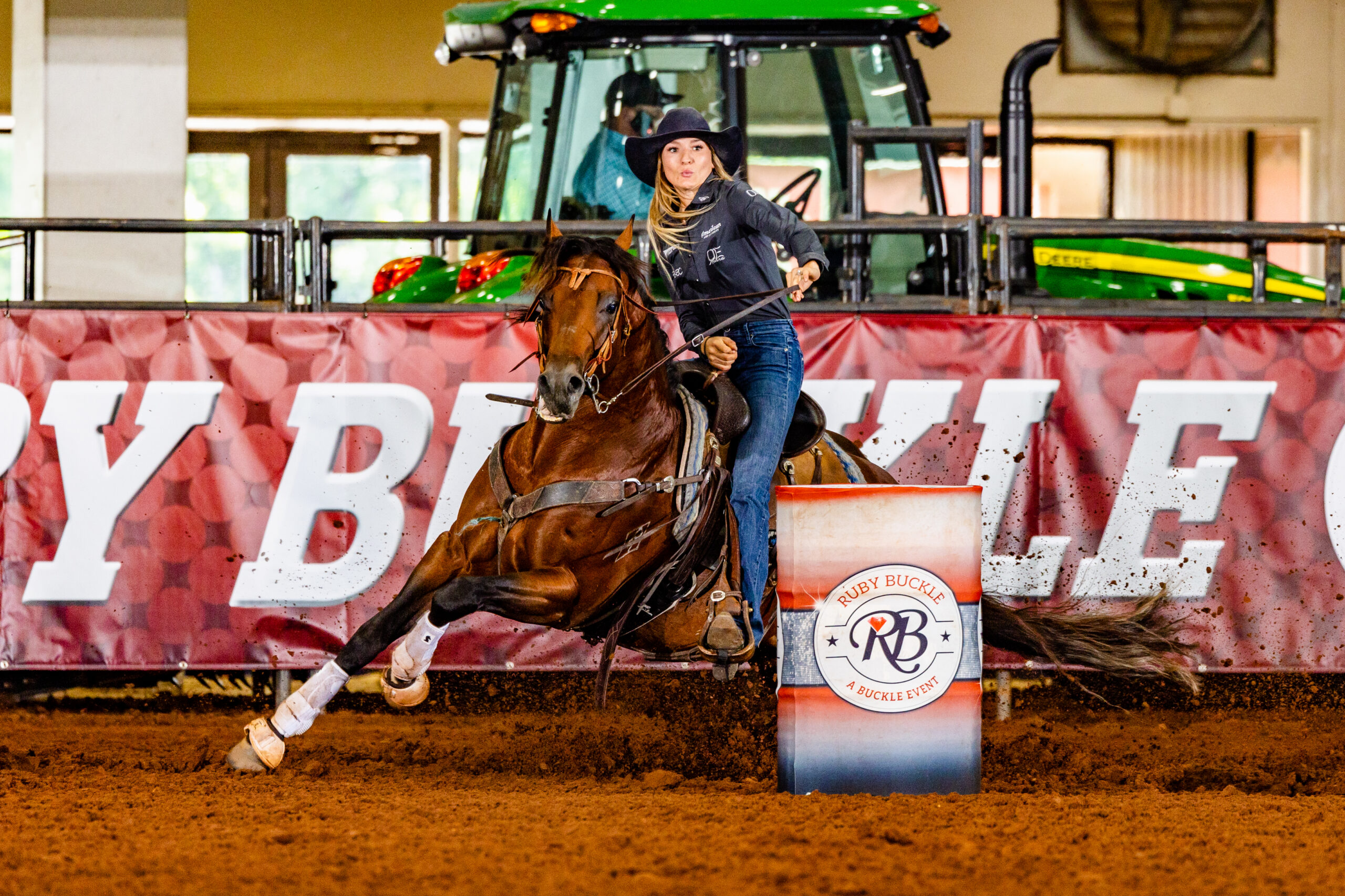 Laura Mote and Watch The Lane power out of a barrel turn