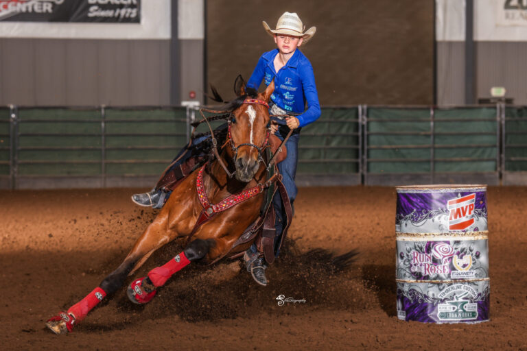 Taylor Armenta and A Smooth Knight turn a barrel