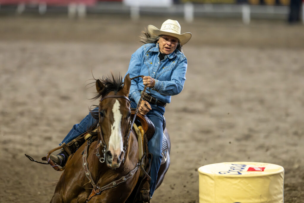 Lanita Peirce, 76, turns a barrel