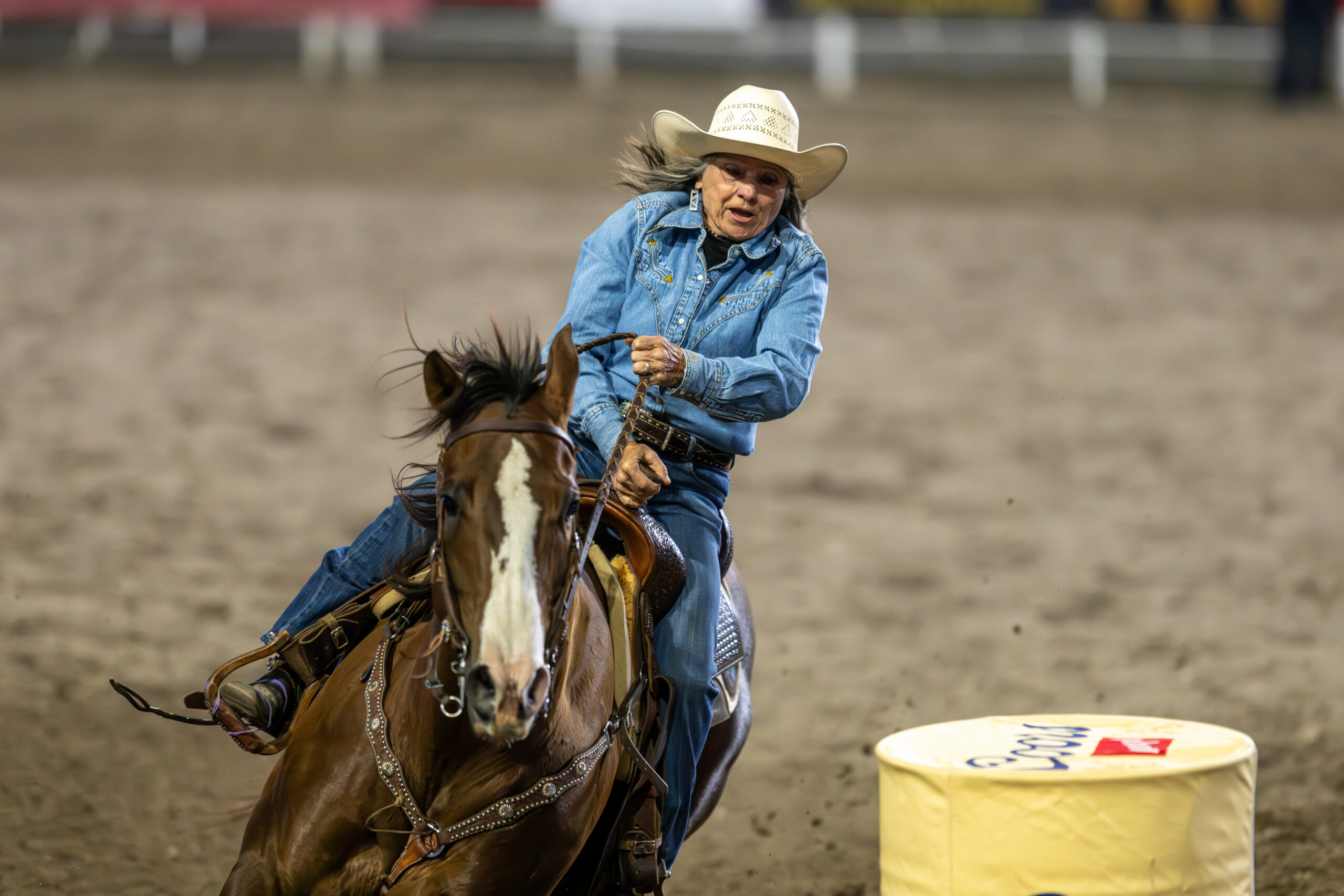 Lanita Peirce, 76, turns a barrel