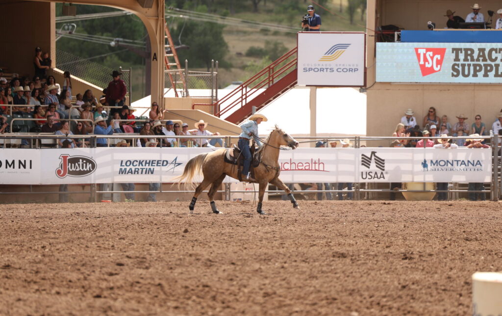 Katelyn Scott pets her horse