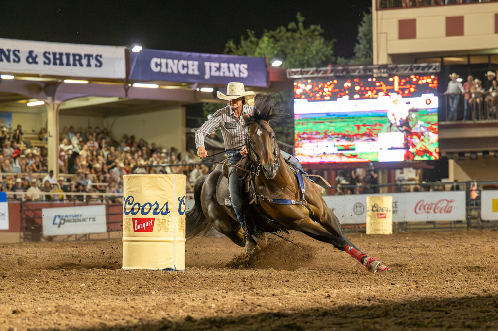 Caitlyn White turns a barrel on the stallion Mr Soul