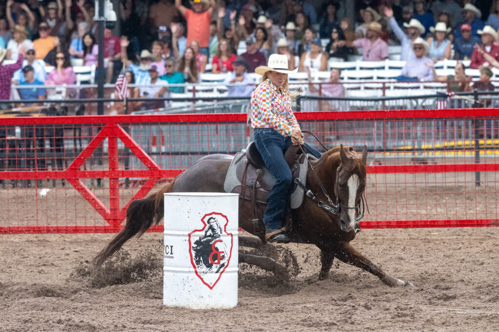 Steely Steiner turns a barrel on her horse