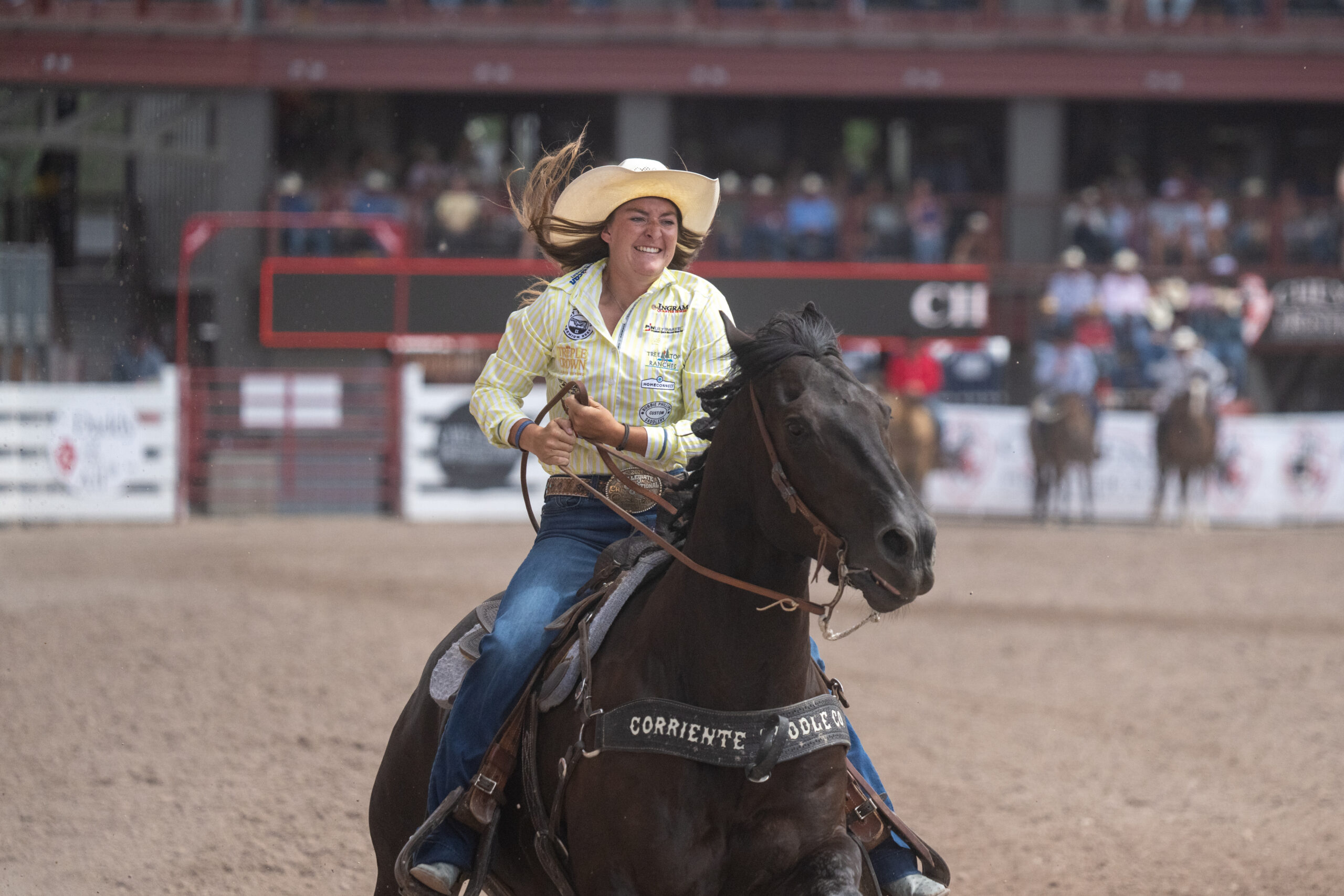 Tayla Moeykens takes a victory lap in Cheyenne