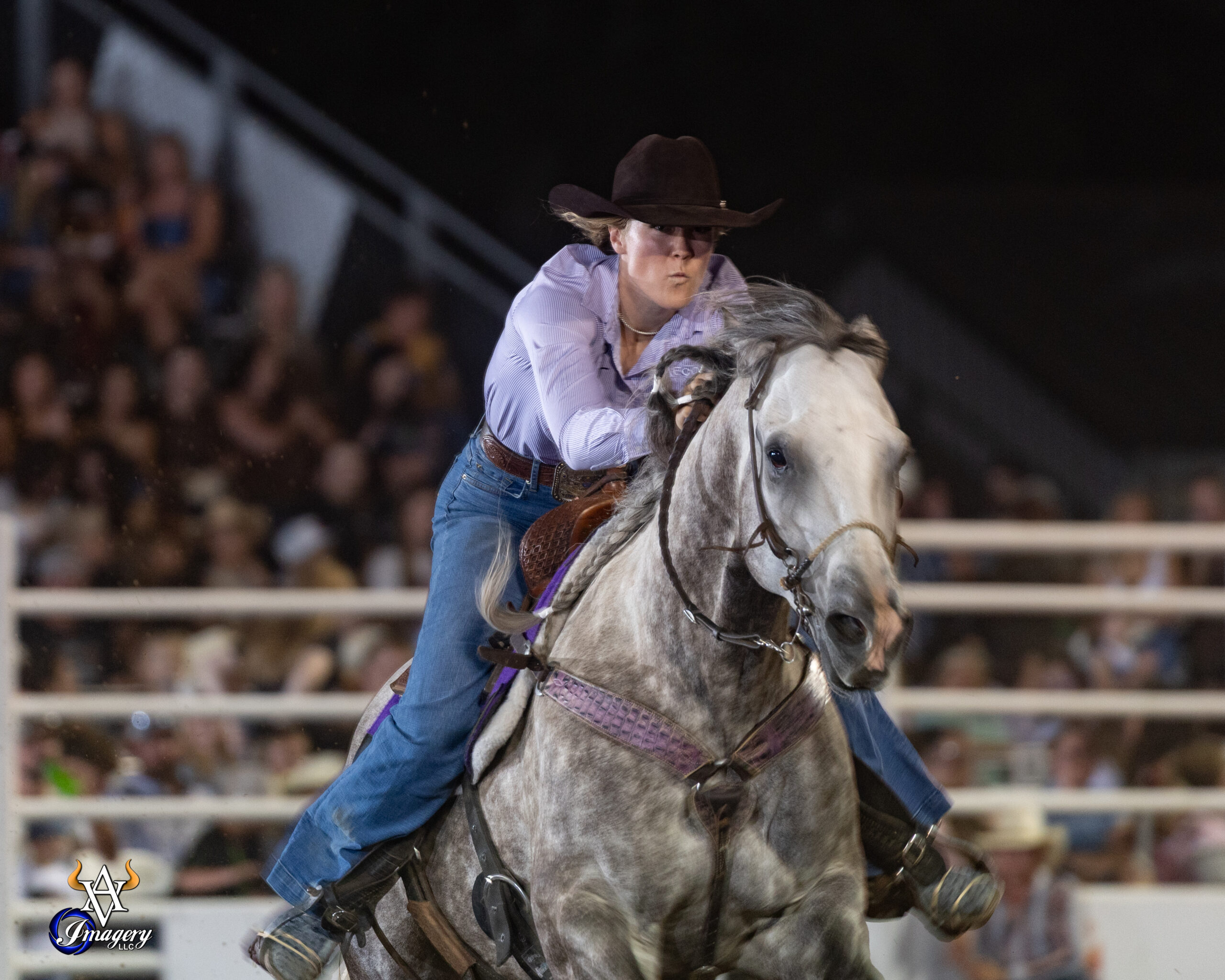 Raelin Jurgens pushes her horse across the finish line