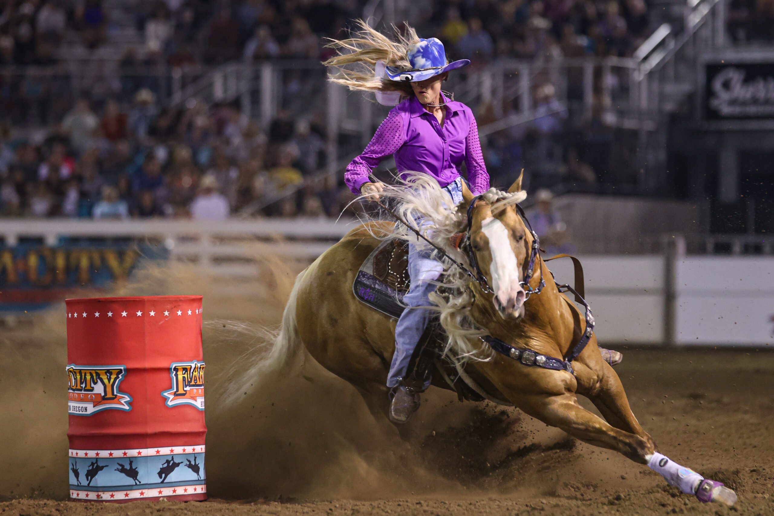 Tricia Aldridge and Adios Pantalones turning a barrel