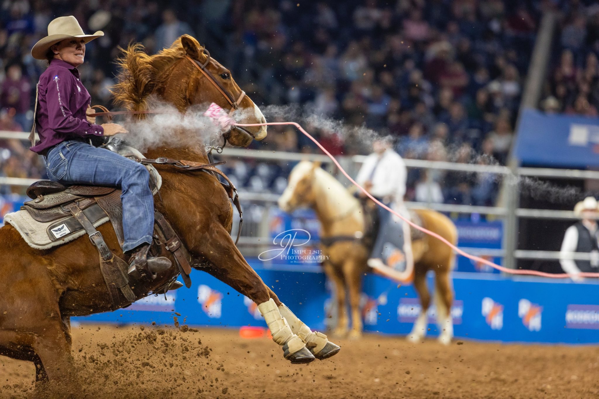 Katie Mundorf breakaway roping at RodeoHouston