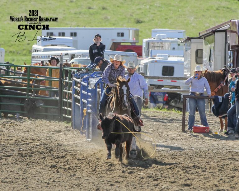 Makayla Mack ropes her breakway calf at a rodeo.