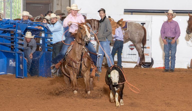 Rylie Edens ropes her calf at the 2023 USTRC Total Feeds 15 & Under Breakaway.