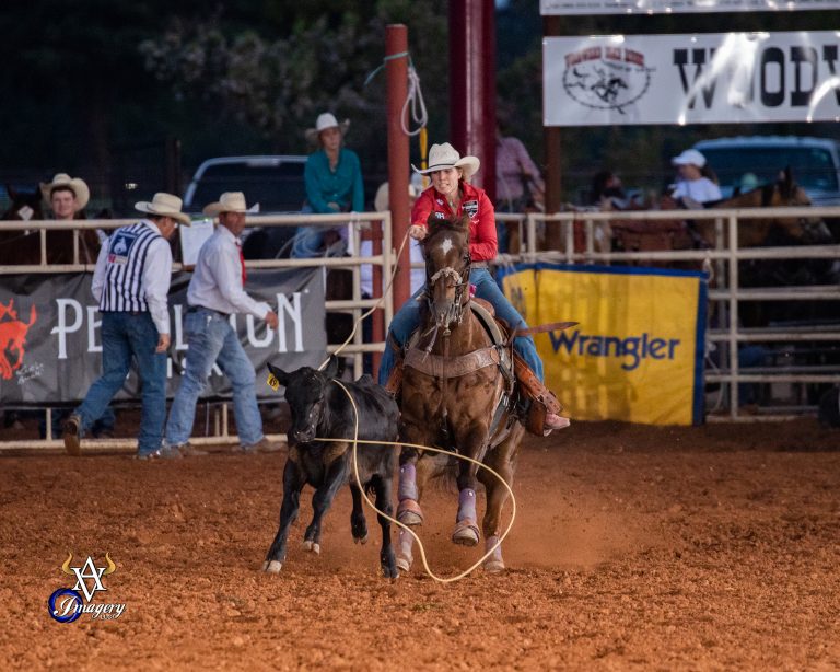 MaryBeth Beam runs a calf down at the Woodward Elks Rodeo in Oklahoma