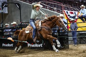 Sarah Angelone bursts out of the roping box