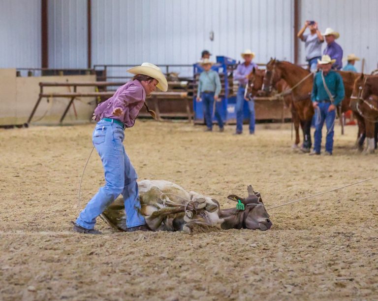 Kassandra Shoemaker competing at the Black Hills Championship Steer Roping in Wall, South Dakota.