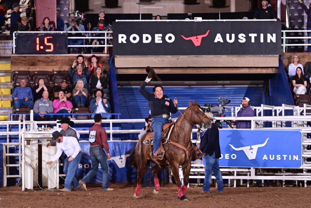 Danielle Lowman cheers after roping in 1.5 seconds at Rodeo Austin 2024, breaking the previous arena record of 1.8 seconds. Photo by James Phifer