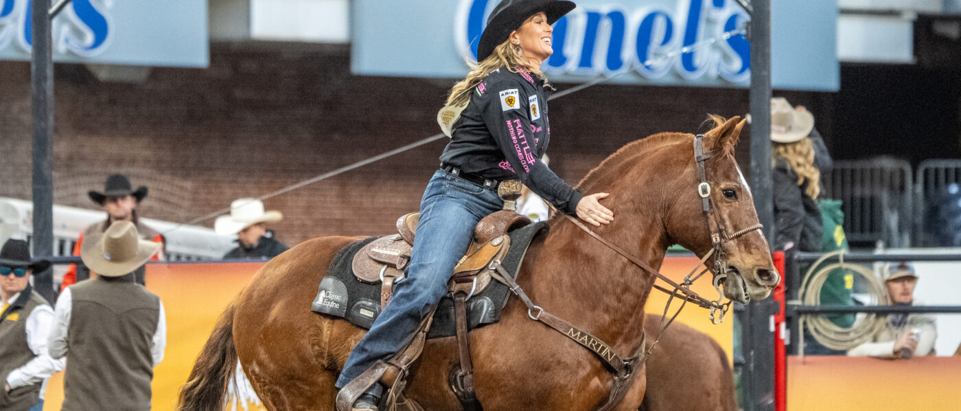 Jackie Crawford and T-Boy strut out of the arena after a big win at the 2025 San Diego Rodeo.