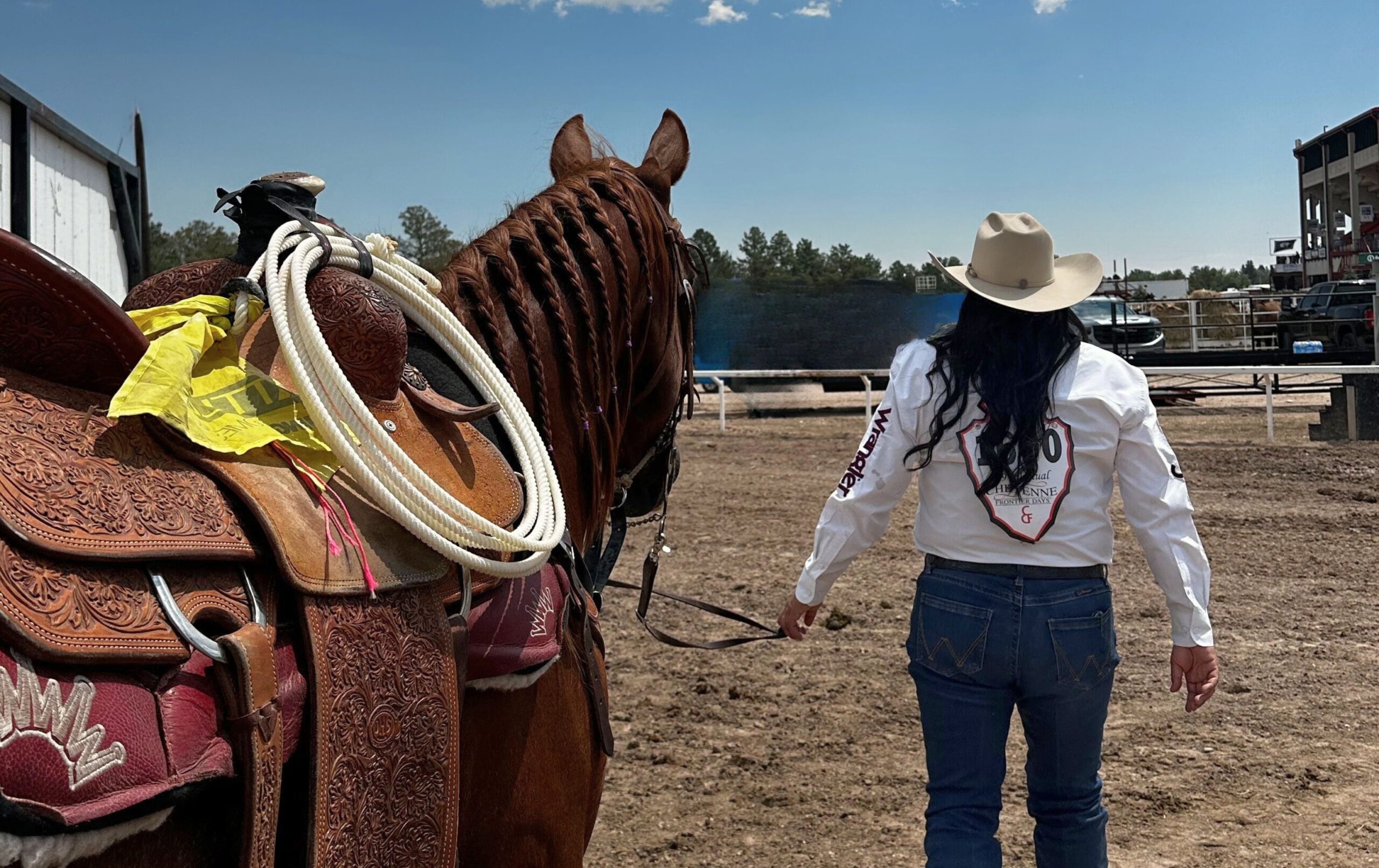 Danielle Lowman leads "Gucci" out onto the track at Cheyenne Frontier Days.