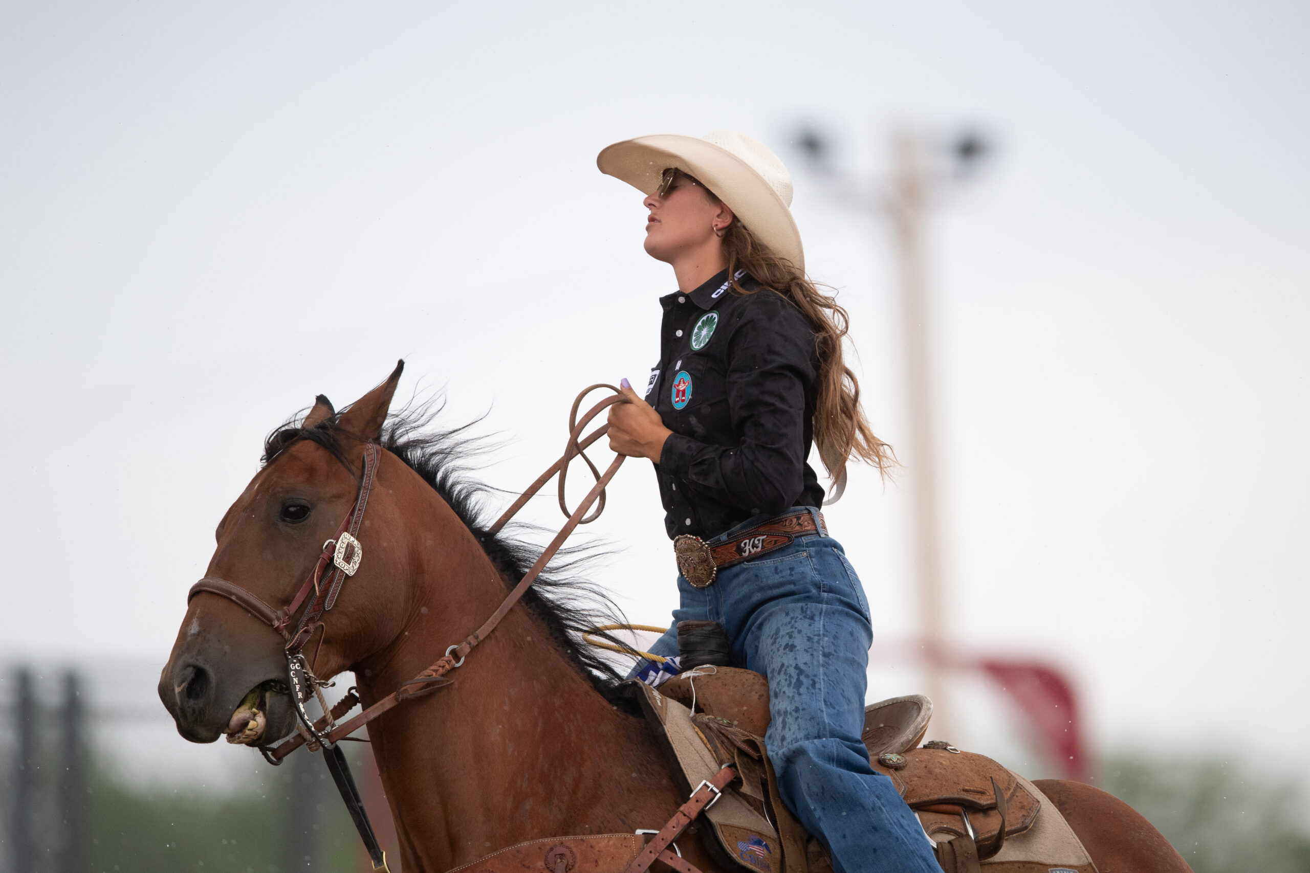 Haiden Thompson rides out of the arena at Cheyenne Frontier Days on gelding "Tom."